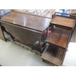 A compactum oak finished, four tier tea trolley with three detachable trays and an 18th century