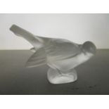 A Lalique, France, frosted and clear glass model of a bird, engraved signature to base