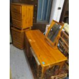 A modern pine dressing table with swing mirror, stool and two bedside chests