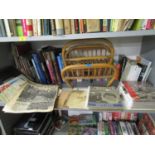 A mixed lot of pictures, wall mirrors and books to include a Private Eye magazine, signed limited
