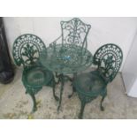 A green painted aluminium garden occasional table and three chairs
