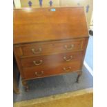 A mahogany bureau on cabriole legs 40" x 29" x 8"