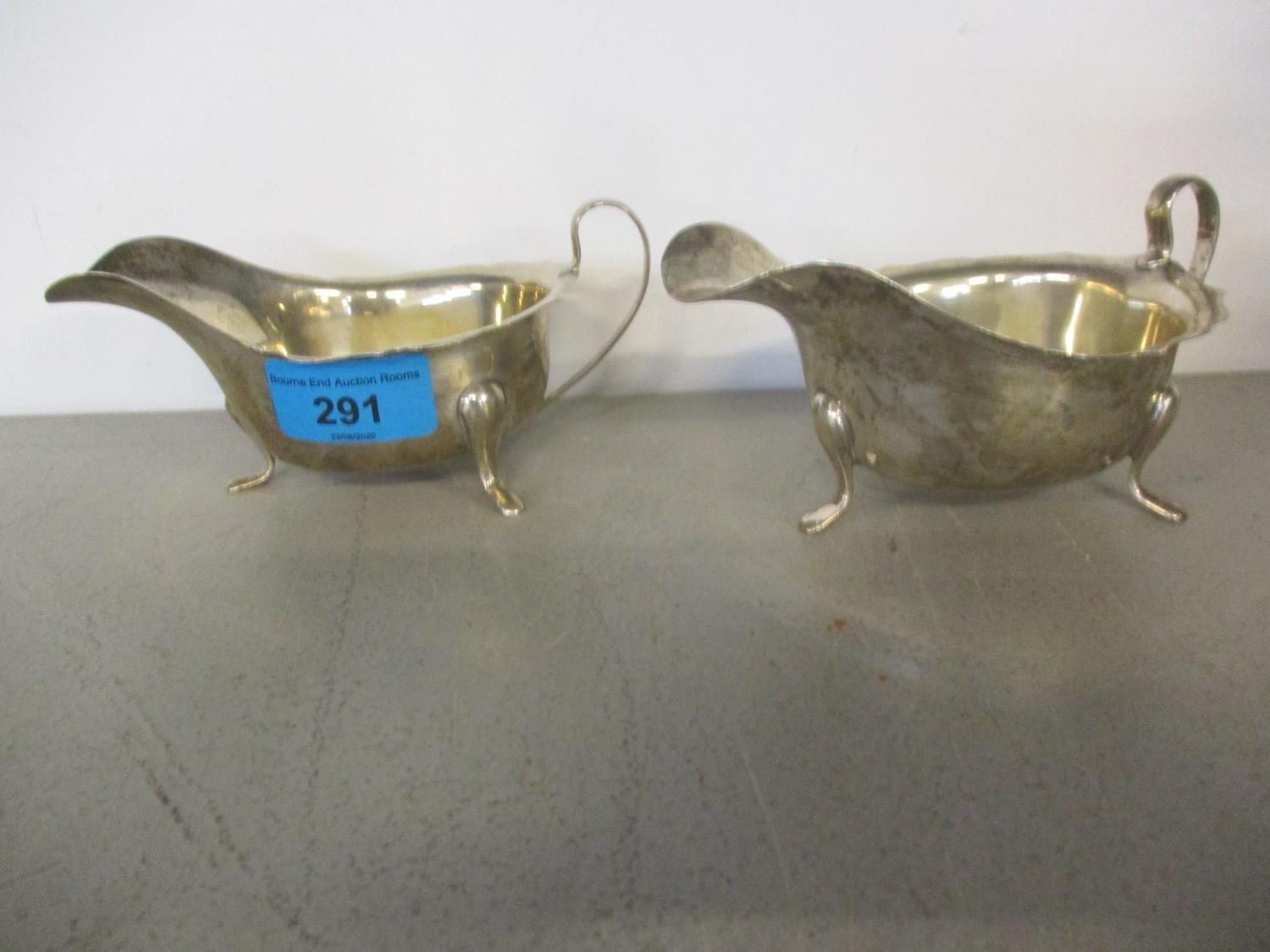 A pair of silver sauce boats