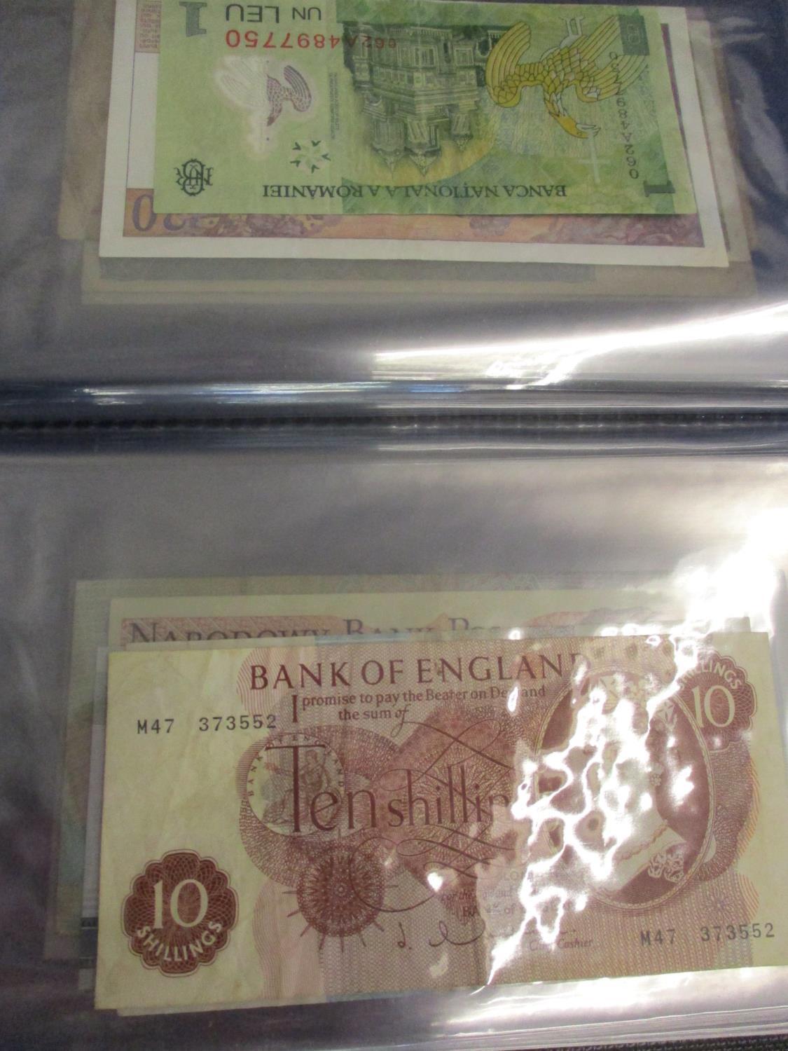 Twenty banknote from around the world to include a £1 Chinese example and others