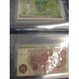 Twenty banknote from around the world to include a £1 Chinese example and others