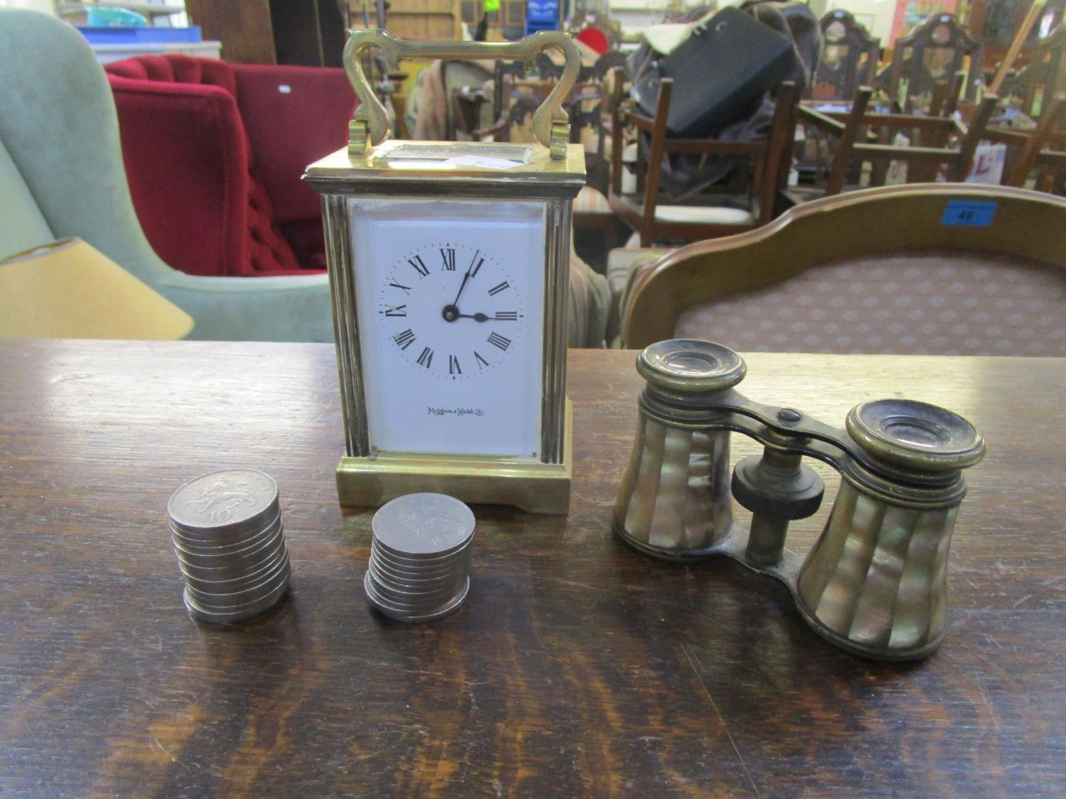 A Mappin & Webb brass cased five window carriage clock, a small group of 10p pieces and a pair of