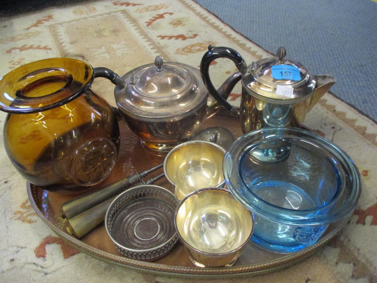 A small quantity of silver plate to include a tea set together with a copper tray and glassware