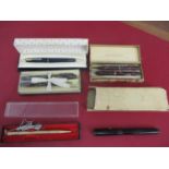 A quantity of vintage pens to include a Barnham duo pen set in original box and a Parker fountain