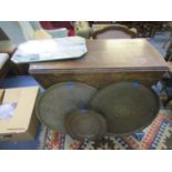 A 1930's oak gate leg table on barley twist legs, a 1930's rectangular wall mirror with truncated