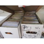 Seven boxes of 45rpm singles, approximately 1000 in total, covering the 1960s to 1990s