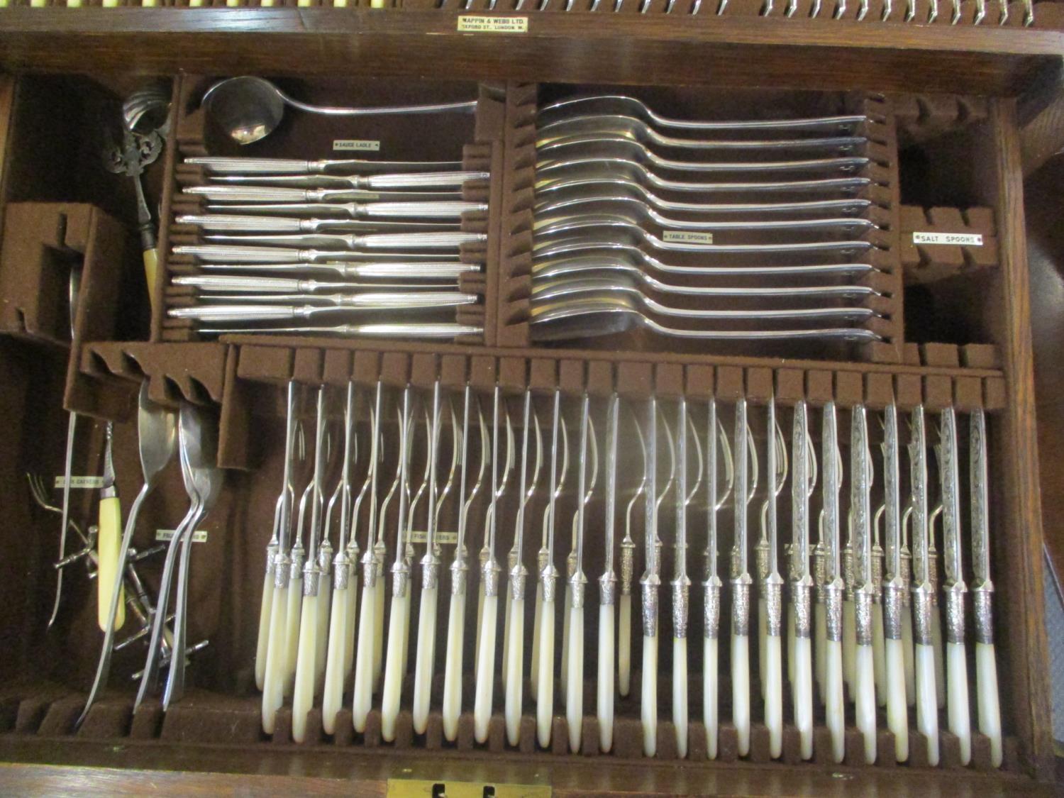 A 1920's oak Mappin & Webb cutlery table having a hinged top with drawer below containing fitted and - Image 4 of 4