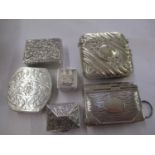 A mixed lot of white metal and silver plated items to include a vesta case, a stamp and vesta case
