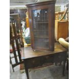 A Georgian oak lowboy having three inset drawers and standing on pad shaped feet 28"h x 38 3/4"w,