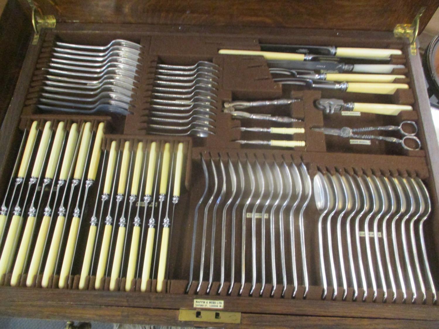 A 1920's oak Mappin & Webb cutlery table having a hinged top with drawer below containing fitted and - Image 3 of 4