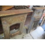 Two Victorian cast iron fire surrounds