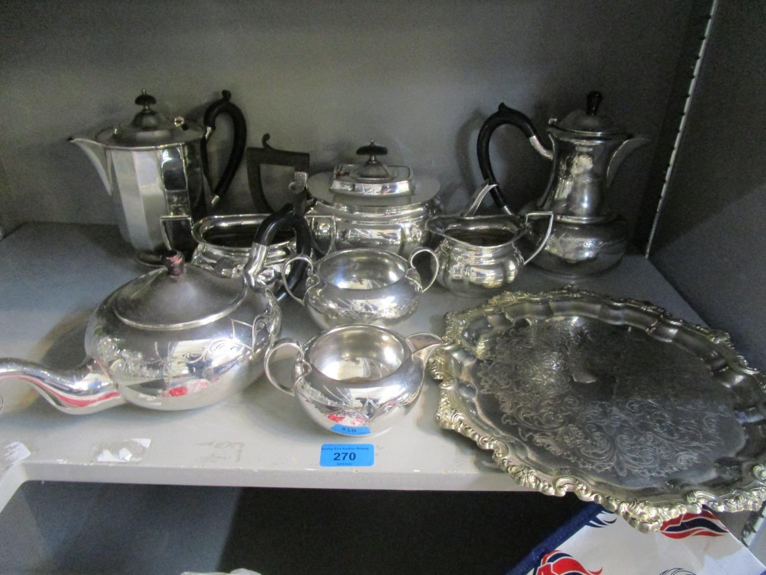 A mixed lot of silver plate to include The Alex Clark Company three piece tea set