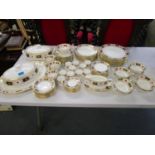 A Royal Crown Derby, Derby Border pattern dinner service to include sets of ten, tureens, soup,