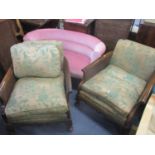 A pair of early 20th century Bergère armchairs, together with a two seater salon sofa and a two tier