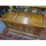 A mid 20th century oak linen chest containing mixed Christmas decorations and games 20 1/2" H x 41