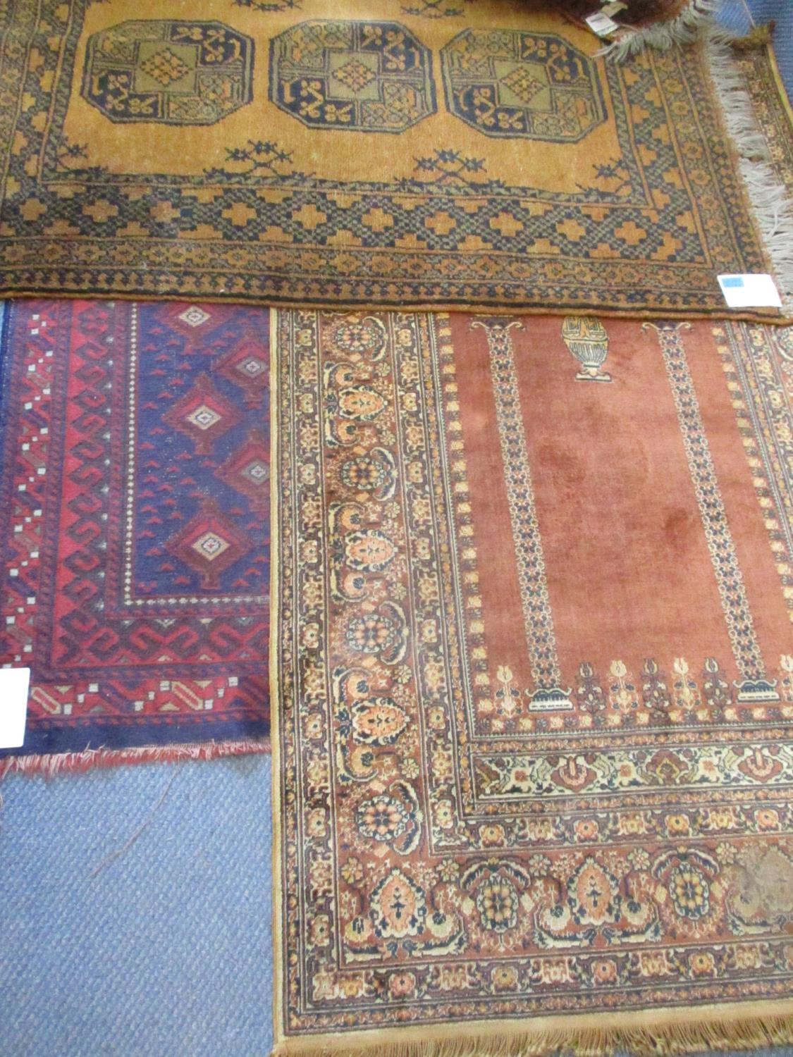 An early 20th century Anatolian silk on cotton carpet, together with a wall hanging 170cm x 100 cm