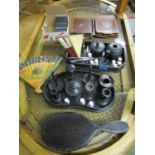 A mixed lot to include two ebony dressing table sets, some with silver mounts, porcelain thimbles, a