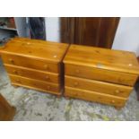 A pair of modern pine three drawer chests, 24 3/4"h x 30"w