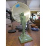 A green painted Art Deco mirror having a stepped base in the form of a nude lady
