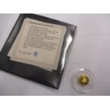 An American 9ct gold coin The Greatest American Presidents, John F Kennedy 1961-1963 0.5g