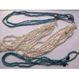 Two Biwa pearl three strand necklaces and two similar green coral necklaces