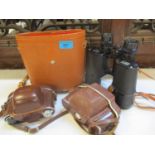 A pair of Jomega coasted lens 7 x 50 cased binoculars, together with two vintage Kodak cameras