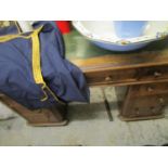 A Victorian oak turn pedestal desk having a green leather inset scriber and nine drawers with bun