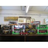 A group of twelve boxed and unboxed Nex models, Solido, Burago and Maisto diecast model cars to