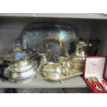 A Gerrard & Co four piece tea service, a Gerrard & Co twin handled tray and other items of silver