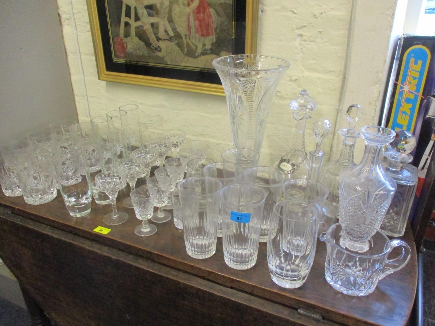 Mixed decanters with stoppers, a cut glass vase, water glasses and mixed 20th century glass to