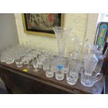 Mixed decanters with stoppers, a cut glass vase, water glasses and mixed 20th century glass to