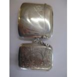 Two silver vesta cases to include one with initials HJ and dated 17th July 1930