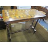 A Victorian marquetry inlaid walnut side table on bobbin turned supports 27 1/2"h x 34 3/4"w