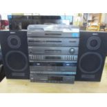 A Sony digital CD player together with a Sony music stacking system, a pair of Sony speakers and a