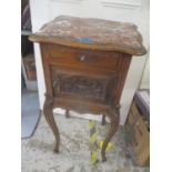 An early 20th century French walnut marble topped pot cupboard having a cupboard door below a single