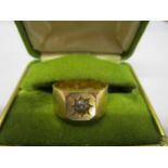 A 18ct gold gypsy ring set with a diamond 9.75 grams