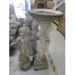 Two garden composition statues to include one with bird bath to the top, 35"h x 14 1/4"w