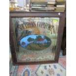 A vintage Southern Comfort wooden framed pub mirror with US patent office registration