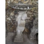 A reconstituted stone garden statue with bird bath to the top, 36"h