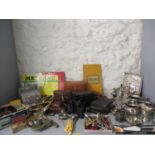 A vintage lot comprising silver plate, cutlery, Meccano, games, binoculars, cameras, corkscrews