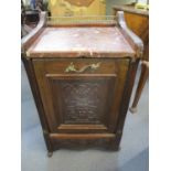 A mahogany cased coal scuttle with drop down door and lead lined bucket within, having a pink marble