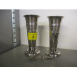 A pair of silver vases together with a silver salt spoon, total weight 150.6g