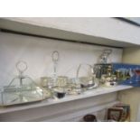 Mixed silver plated table serving items to include a muffin dish and entrée dishes, together with