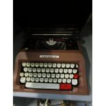 A vintage Underwood 142 typewriter in travel case