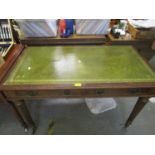 A late 19th century Maple & Co mahogany writing table with a later top and green scriber over two