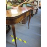 An early 20th century mahogany fold over card table on cabriole legs A/F